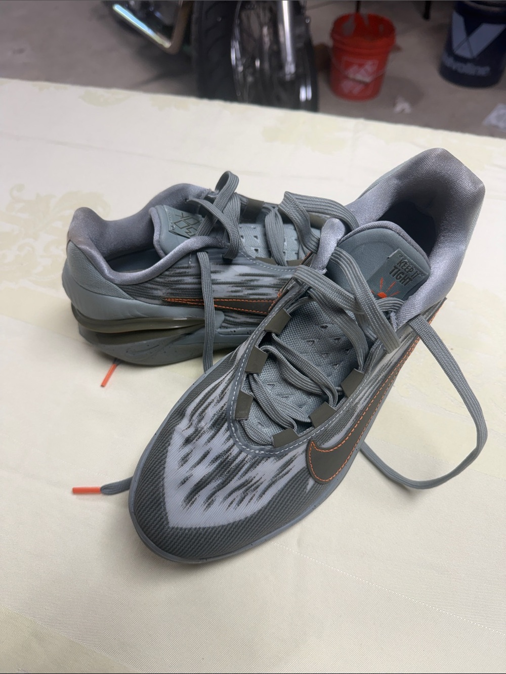 Nike Men's Gray Sneakers with Orange Stitching
